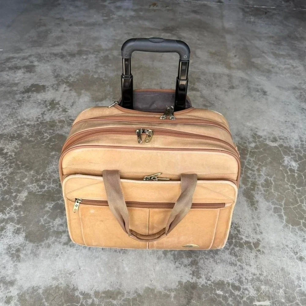 Vintage Natural Tan leather rolling luggage carry on suit case duffle bag